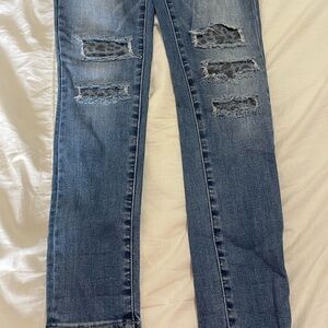 Distressed Blue Denim Jeans